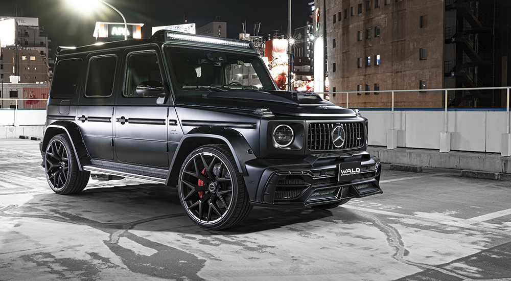 WALD International body kit and wheels on a black Mercedes-AMG G-Class