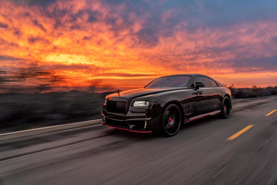 WALD International exterior styling on a black Rolls-Royce Wraith at sunset