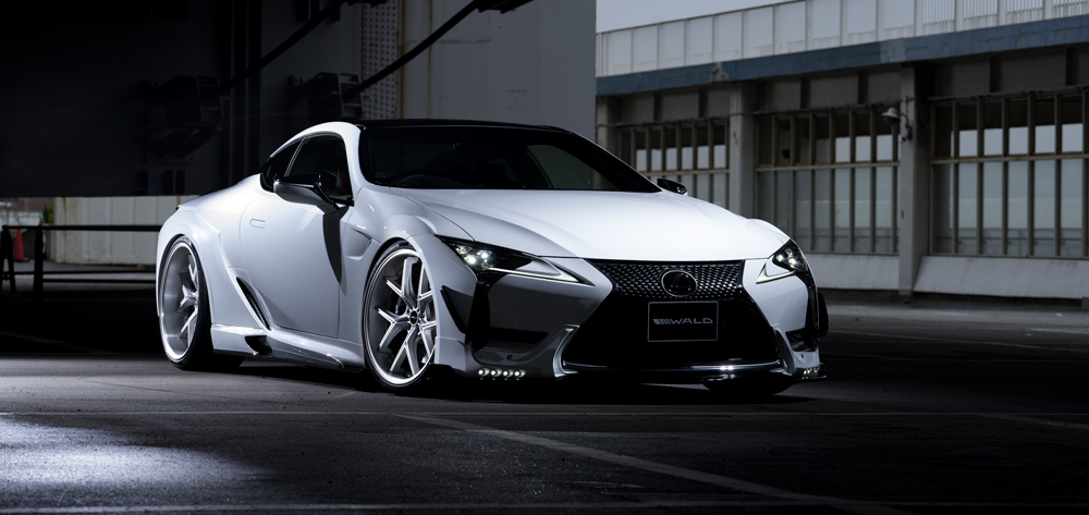 White Lexus LC500 with a Wald International Sports Line aerodynamic kit and silver forged wheels